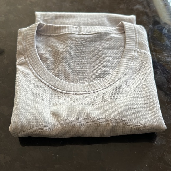 Lululemon, short sleeve top , gray color , size 8 , good condition - Picture 3 of 3